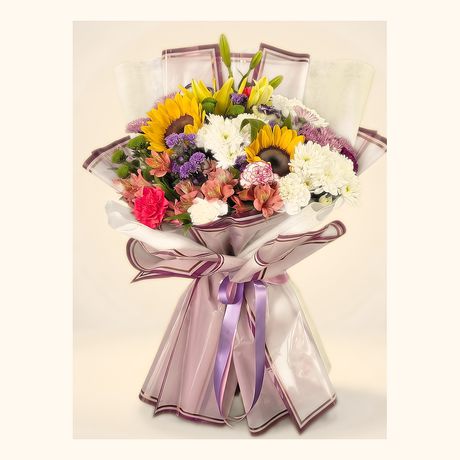 Sunflowers and white chrysanthemums in a grey and plum wrap